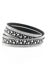 Load image into Gallery viewer, Bubbly silver studs, and rows of glittery white rhinestones are encrusted along strips of black suede. The elongated design allows for a trendy double wrap around the wrist. Features an adjustable snap closure.  Sold as one individual bracelet.