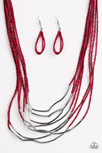 Load image into Gallery viewer, Infused with two large silver fittings, shiny red seed beads are threaded along countless strands, creating dramatic layers below the collar. Shimmery silver accents slide along the centers of the strands, adding depth and shimmer to the seasonal palette. Features an adjustable clasp closure.  Sold as one individual necklace. Includes one pair of matching earrings.   