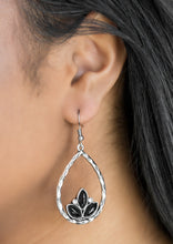 Load image into Gallery viewer, Shiny black beads adorn the bottom of a hammered silver teardrop, coalescing into a whimsical lotus pattern. Dainty white rhinestones flank the shiny beads for a refined finish. Earring attaches to a standard fishhook fitting.  Sold as one pair of earrings.