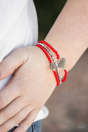 Featuring a gray resin rose and a shimmery silver heart charm, dainty red beads and faceted silver beads are threaded along stretchy bands for a vintage inspired look.  Sold as one set of three bracelets.  Always nickel and lead free.