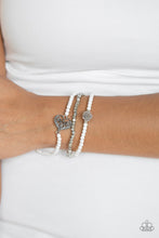 Load image into Gallery viewer, Featuring a gray resin rose and a shimmery silver heart charm, dainty white beads and faceted silver beads are threaded along stretchy bands for a vintage inspired look.  Sold as one set of three bracelets.  Always nickel and lead free.