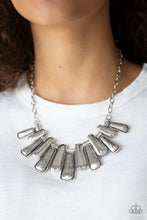 Load image into Gallery viewer, Featuring smooth and etched finishes, a collection of glistening silver plates link below the collar, creating a blinding fringe. Features an adjustable clasp closure.  Sold as one individual necklace. Includes one pair of matching earrings.  Always nickel and lead free.