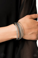 Load image into Gallery viewer, Featuring an array of chain-like and tribal inspired patterns, a collection of mismatched silver bangles slides up and down the wrist for an edgy look.  Sold as one set of six bracelets.