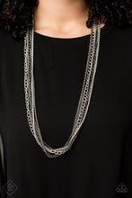 Load image into Gallery viewer, A chaotic mix of popcorn, classic, and dainty chains stream down the chest in an industrial masterpiece. The alternating finishes of shiny silver and glistening gunmetal adds miles of attitude to the design, resulting in an edgy collision of mixed metallic shimmer. Features an adjustable clasp closure.