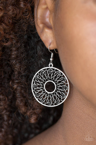 Dotted in dainty black rhinestones, glistening silver wires twist and interlock inside of a shimmery silver hoop for a whimsical look. Earring attaches to a standard fishhook fitting.  Sold as one pair of earrings.  Always nickel and lead free.