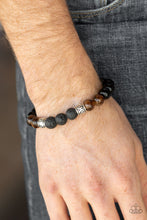 Load image into Gallery viewer, ESSENTIAL OIL ALERT!!!  Infused with ornate silver beads, a collection of polished black beads, black lava rock beads, and brown stone beads are threaded along a stretchy band around the wrist for a seasonal look.  Sold as one individual bracelet.  Always nickel and lead free. 
