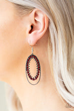 Load image into Gallery viewer,   Ringed in a studded silver frame, glittery red and hematite rhinestones collect into a glittery lure for a refined flair. Earring attaches to a standard fishhook fitting.  Sold as one pair of earrings. Always nickel and lead free.