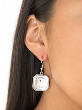 Load image into Gallery viewer, A faceted white gem is pressed into a glistening silver frame for a dramatic look. Earring attaches to a standard fishhook fitting.  Sold as one pair of earrings.   