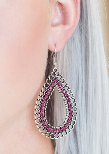 Antiqued chain links spin around a row of glittery pink rhinestones, coalescing into an edgy silver teardrop. Earring attaches to a standard fishhook fitting.  Sold as one pair of earrings.