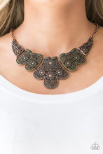 Load image into Gallery viewer, Embossed in whimsical floral detail, antiqued brass and copper plates connect below the collar for a statement making look. Features an adjustable clasp closure.  Sold as one individual necklace. Includes one pair of matching earrings.  Always nickel and lead free.