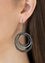 Load image into Gallery viewer, Featuring delicately hammered bottoms, a collection of shiny gunmetal hoops gradually increase in size as they dangle from the ear for a casual shine. Earring attaches to a standard fishhook fitting.  Sold as one pair of earrings. 