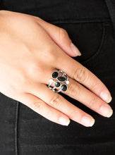 Load image into Gallery viewer, Varying in shape and cut, glassy white rhinestones and glittery black rhinestones tumble down the center of layered silver bands for an edgy look. Features a stretchy band for a flexible fit.  Sold as one individual ring.  Always nickel and lead free.