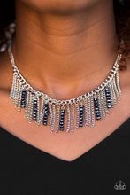 Load image into Gallery viewer, Threaded along metallic rods, stacks of blue beading trickle from the bottom of a silver chain. The glittery accents trickle between trestles of silver chains, creating a fierce fringe below the collar. Features an adjustable clasp closure.  Sold as one individual necklace. Includes one pair of matching earrings.  Always nickel and lead free.