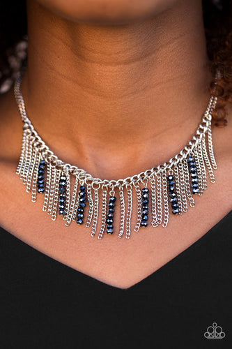 Threaded along metallic rods, stacks of blue beading trickle from the bottom of a silver chain. The glittery accents trickle between trestles of silver chains, creating a fierce fringe below the collar. Features an adjustable clasp closure.  Sold as one individual necklace. Includes one pair of matching earrings.  Always nickel and lead free.