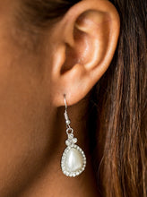 Load image into Gallery viewer, A pearly white teardrop bead is pressed into a white rhinestone encrusted frame, creating a timeless lure. Earring attaches to a standard fishhook fitting.  Sold as one pair of earrings.  