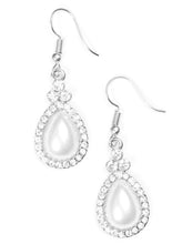Load image into Gallery viewer, A pearly white teardrop bead is pressed into a white rhinestone encrusted frame, creating a timeless lure. Earring attaches to a standard fishhook fitting.  Sold as one pair of earrings.
