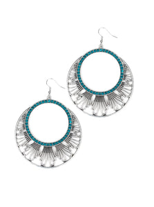 An airy geometric fringe flares out from the bottom of a ring of glittery blue rhinestones for an edgy tribal look. Earring attaches to a standard fishhook fitting.  Sold as one pair of earrings.