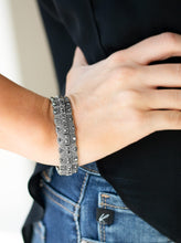 Load image into Gallery viewer, Encrusted in glittery hematite rhinestones, ornately studded silver frames are threaded along stretchy bands for an edgy-glamorous look.  Sold as one individual bracelet.  