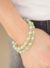 Load image into Gallery viewer, Classic green pearls and glittery crystal-like beads are threaded along a long wire to create an infinity wrap bracelet.  Sold as one individual bracelet.