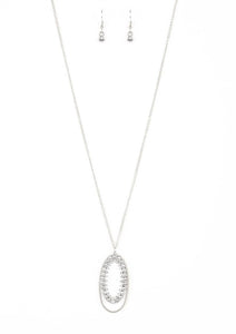 Ringed in a studded silver frame, glittery white rhinestones collect into glamorous pendant at the bottom of a lengthened silver chain for a refined flair. Features an adjustable clasp closure.  Sold as one individual necklace. Includes one pair of matching earrings.   Always nickel and lead free.