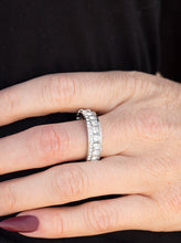 Load image into Gallery viewer, Featuring edgy square cuts, a row of glittery white rhinestones are encrusted along a glistening silver band. Dainty white rhinestones are encrusted along the top of the band, adding classic shimmer to the sassy palette. Features a dainty stretchy band for a flexible fit.  Sold as one individual ring. 