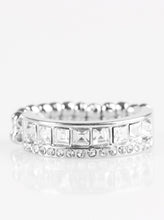 Load image into Gallery viewer, Featuring edgy square cuts, a row of glittery white rhinestones are encrusted along a glistening silver band. Dainty white rhinestones are encrusted along the top of the band, adding classic shimmer to the sassy palette. Features a dainty stretchy band for a flexible fit.  Sold as one individual ring.