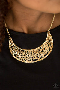 Gold vine-like filigree climbs a crescent shaped frame, creating a dramatic pendant below the collar. Features an adjustable clasp closure.  Sold as one individual necklace. Includes one pair of matching earrings.  Always nickel and lead free.
