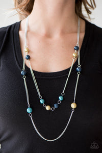 Colorful pearls trickle along doubled strands of glistening silver chain, creating refined layers across the chest. Features an adjustable clasp closure.  Sold as one individual necklace. Includes one pair of matching earrings.  Always nickel and lead free.