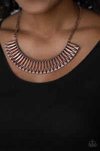 Infused with dainty copper studs, sleek geometric copper plates connect with hammered copper triangles, creating a fierce half-moon plate below the collar. Features an adjustable clasp closure.  Sold as one individual necklace. Includes one pair of matching earrings.  Always nickel and lead free.  