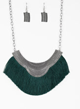 Load image into Gallery viewer, Dotted in ornate detail, a scalloped silver plate gives way to a flirtatious green fringe, creating a royal statement piece below the collar. Features an adjustable clasp closure.  Sold as one individual necklace. Includes one pair of matching earrings.