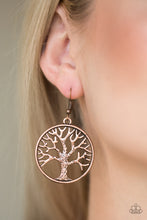 Load image into Gallery viewer, Brushed in an antiqued shimmer, a lifelike tree branches out across a copper hoop for a seasonal look. Earring attaches to a standard fishhook fitting.  Sold as one pair of earrings.  Always nickel and lead free.