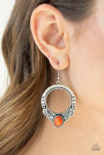 Load image into Gallery viewer, An oval orange stone is pressed into the bottom of a scalloped silver hoop stamped and studded in trendy patterns for a southwestern inspired look. Earring attaches to a standard fishhook fitting.  Sold as one pair of earrings.  Always nickel and lead free.
