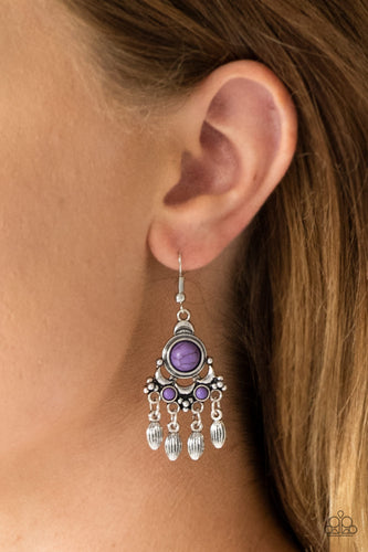 Dotted with vivacious purple stone accents, an ornate silver frame gives way to a silver beaded fringe for a seasonal look. Earring attaches to a standard fishhook fitting.  Sold as one pair of earrings.  Always nickel and lead free.