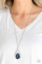 Load image into Gallery viewer, A glittery blue teardrop gem is pressed into a silver frame radiating with glassy white rhinestones. The glamorous pendant swings from the bottom of a shimmery silver chain for a refined look. Features an adjustable clasp closure.  Featured inside The Preview at ONE Life!   Sold as one individual necklace. Includes one pair of matching earrings.   Always nickel and lead free.