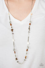 Load image into Gallery viewer, Brushed in shell-like iridescence, bits of brown and white stone beading trickles along a shimmery silver chain. Mismatched silver accents are sprinkled between the earthy accents for a seasonal finish. Features an adjustable clasp closure.  Sold as one individual necklace. Includes one pair of matching earrings.  Always nickel and lead free.