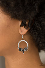 Load image into Gallery viewer, Featuring round and emerald style cuts, radiant hematite and black rhinestones are encrusted along the bottom of an ornate silver hoop for an edgy look. Earring attaches to a standard fishhook fitting.  Sold as one pair of earrings.  Always nickel and lead free. 