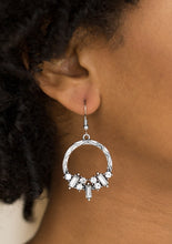 Load image into Gallery viewer, Featuring round and emerald style cuts, radiant white rhinestones are encrusted along the bottom of an ornate silver hoop for an edgy look. Earring attaches to a standard fishhook fitting.  Sold as one pair of earrings.