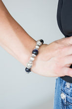 Load image into Gallery viewer, Glassy blue and ornate silver beads are threaded along a stretchy band around the wrist for a whimsical look.  Sold as one individual bracelet. Always nickel and lead free.