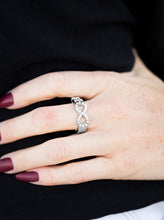 Load image into Gallery viewer, Encrusted in glittery white rhinestones, a silver infinity loops across the finger in a timeless fashion. Features a dainty stretchy band for a flexible fit.  Sold as one individual ring.
