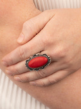 Load image into Gallery viewer, A fiery red stone is pressed into an ornate silver frame rippling with studded and serrated textures for a seasonal flair. Features a stretchy band for a flexible fit.  Sold as one individual ring.
