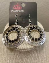 Load image into Gallery viewer, Refreshing black stones spin around the center of a shimmery silver hoop stamped in tribal inspired patterns for a seasonal look. Earring attaches to a standard fishhook fitting.  Sold as one pair of earrings.  Always nickel and lead free.  Fashion Fix Exclusive