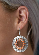 Load image into Gallery viewer, Refreshing orange stones spin around the center of a shimmery silver hoop stamped in tribal inspired patterns for a seasonal look. Earring attaches to a standard fishhook fitting.  Sold as one pair of earrings.  Exclusive Summer 2019 Party Pack Item   