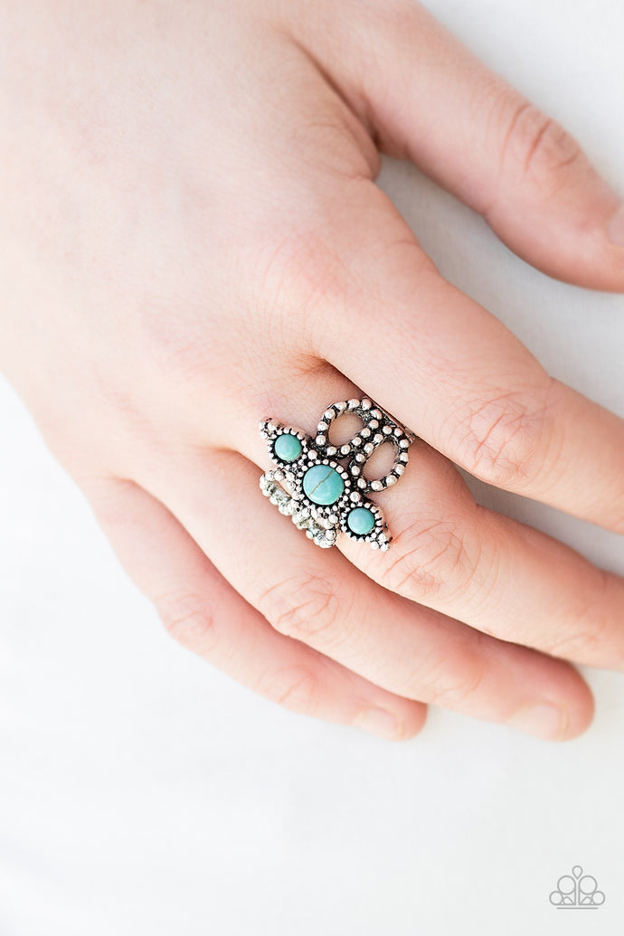 Dainty turquoise stones stack down the center of a frilly silver band radiating with studded textures. Features a stretchy band for a flexible fit.  Sold as one individual ring.  Always nickel and lead free.
