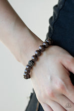 Load image into Gallery viewer, Infused with a glittery hematite rhinestone encrusted bead, a collection of pearly gunmetal beads are threaded along a stretchy band around the wrist for a glamorous look.  Sold as one individual bracelet.  Always nickel and lead free.