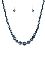 Load image into Gallery viewer, Gradually increasing in size, luminescent blue pearls trickle below the collar for a classic look. Encrusted in dazzling white rhinestones, glittery rings are sprinkled between the pearls for a timeless finish. Features an adjustable clasp closure.  Sold as one individual necklace. Includes one pair of matching earrings.