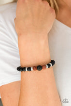 Load image into Gallery viewer, Essential Oil Alert!! Infused with dainty silver accents, a collection of smooth black stones, and black and brown lava rock are threaded along a stretchy band for a seasonal fashion.  Sold as one individual bracelet.   Always nickel and lead free.
