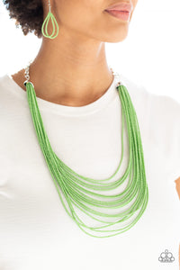 Infused with two bold silver fittings, row after row of green seed beads layer across the chest for a seasonal fashion. Features an adjustable clasp closure.  Sold as one individual necklace. Includes one pair of matching earrings.  Always nickel and lead free.