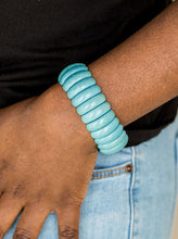Load image into Gallery viewer, Refreshing turquoise stone beads are threaded along stretchy bands, creating an earthy look around the wrist. Sold as one individual bracelet.