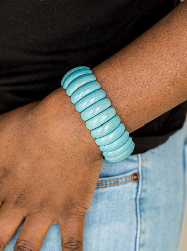 Refreshing turquoise stone beads are threaded along stretchy bands, creating an earthy look around the wrist. Sold as one individual bracelet.