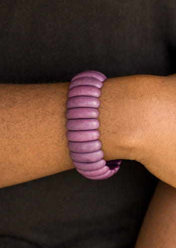 Vivacious purple stone beads are threaded along stretchy bands, creating an earthy look around the wrist.  Sold as one individual bracelet. 